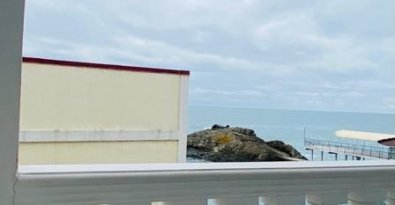 Two-room apartment with partial sea view